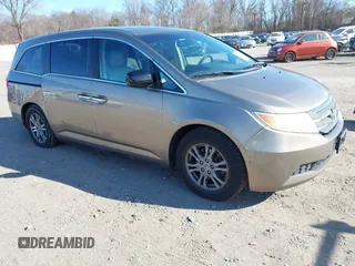 2012 Honda Odyssey EX-L with VIN 5FNRL5H63CB016526, listed as a IAAI auction lot 41701396 with 132,016 mi miles and . Bid and sale history available at carsss.com. Image 1.