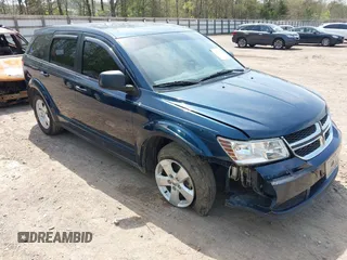2013 Dodge Journey SE z VIN 3C4PDCAB2DT563578, wystawiony jako IAAI lot #42007512 z przebiegiem 166 904 mil mil oraz . Historia ofert i sprzedaży dostępna na DreamBid. Obrazek 1.