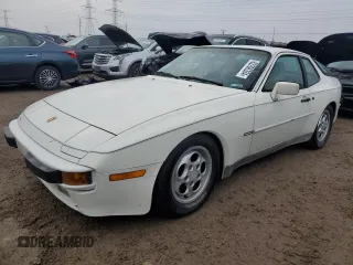 1987 Porsche 944 z VIN WP0AB0948HN477584, wystawiony jako Copart lot #82206334 z przebiegiem 119 549 mil mil oraz Czysty tytuł • Clean title. Historia ofert i sprzedaży dostępna na DreamBid. Obrazek 1.