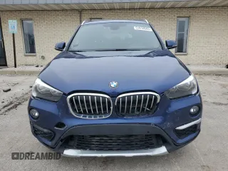 2017 BMW X1 xDrive28i with VIN WBXHT3C30H5F71011, listed as a Copart auction lot 51018645 with 83,203 mi miles and Clean Title. Bid and sale history available at carsss.com. Image 5.