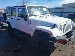 2017 Jeep Wrangler Unlimited Sahara z VIN 1C4BJWEG2HL552382, wystawiony jako IAAI lot #41631092 z przebiegiem 96 097 mil mil oraz . Historia ofert i sprzedaży dostępna na DreamBid. Obrazek 1.