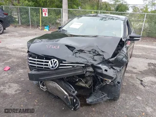 2013 Volkswagen Passat SE w/Sunroof with VIN 1VWBH7A33DC150043, listed as a IAAI auction lot 41411518 with 132,208 mi miles. Bid and sale history available at carsss.com. Image 6.