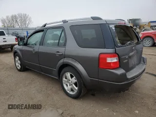 2005 Ford Freestyle Limited with VIN 1FMDK06115GA54221, listed as a Copart auction lot 88354485 with 128,550 mi miles and Salvage Title. Bid and sale history available at carsss.com. Image 2.