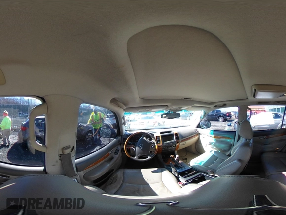 2005 Lexus GX with VIN JTJBT20XX50081621, listed as a IAAI auction lot 41661384 with 208,071 mi miles. Bid and sale history available at carsss.com. Image 18.
