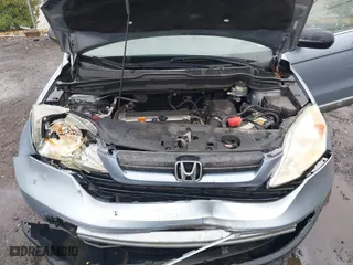 2008 Honda CR-V LX with VIN 5J6RE48328L048201, listed as a IAAI auction lot 42012002 with 166,876 mi miles. Bid and sale history available at carsss.com. Image 10.