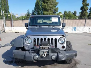 2018 Jeep Wrangler Sport S with VIN 1C4GJWAG9JL931235, listed as a IAAI auction lot 42417596 with 93,635 mi miles and . Bid and sale history available at DreamBid. Image 12.