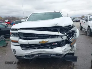 2018 Chevrolet Silverado 1500 LT with VIN 3GCUKREC3JG453433, listed as a IAAI auction lot 38138441 with 53,496 mi miles. Bid and sale history available at carsss.com. Image 6.