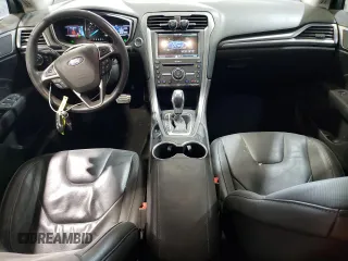 2016 Ford Fusion Titanium Hybrid with VIN 3FA6P0RUXGR355351, listed as a Copart auction lot 56516025 with 117,964 mi miles and Salvage title. Bid and sale history available at DreamBid. Image 8.