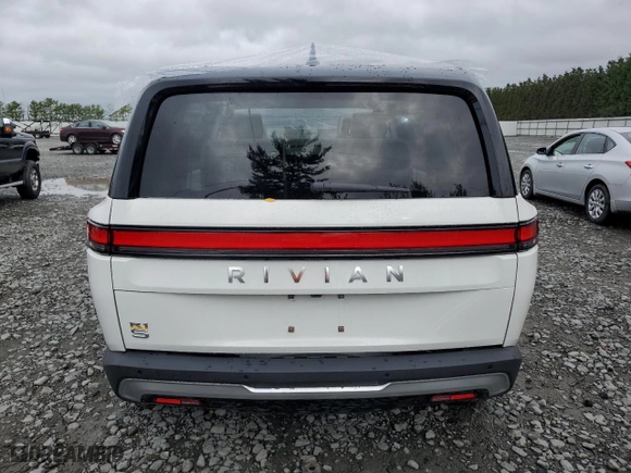 2023 Rivian R1S Adventure with VIN 7PDSGABA6PN017889, listed as a Copart auction lot 68860864 with 7,661 mi miles and Salvage Title. Bid and sale history available at carsss.com. Image 6.