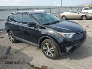 2018 Toyota RAV4 XLE with VIN 2T3WFREV3JW469307, listed as a Copart auction lot 57092295 with 47,639 mi miles and Salvage title. Bid and sale history available at DreamBid. Image 4.