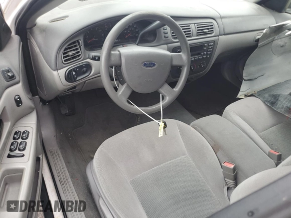 2006 Ford Taurus SE с VIN 1FAFP53U66A245685, выставлен на аукционе Copart как лот 53472415 с пробегом 100 110 миль миль и Списание • Salvage title. История ставок и продаж доступна на DreamBid. Изображение 8.