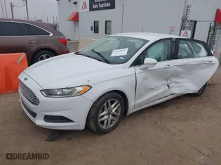 2016 Ford Fusion SE with VIN 3FA6P0HDXGR235289, listed as a IAAI auction lot 41545690 with 127,334 mi miles. Bid and sale history available at carsss.com. Image 2.