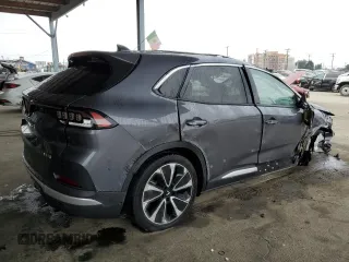 2024 VinFast VF 8 Plus z VIN RLLV1AFA1RH007634, wystawiony jako Copart lot #76579764 z przebiegiem 1086 mil mil oraz Szkody całkowita. Historia ofert i sprzedaży dostępna na DreamBid. Obrazek 3.