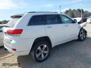 2014 Jeep Grand Cherokee Overland with VIN 1C4RJFCT6EC126897, listed as a IAAI auction lot 41826773 with 115,251 mi miles. Bid and sale history available at carsss.com. Image 4.
