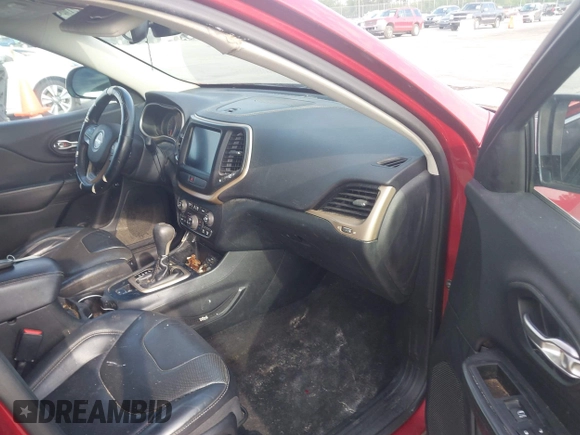 2016 Jeep Cherokee Limited with VIN 1C4PJLDSXGW127497, listed as a IAAI auction lot 42173536 with 240,866 mi miles and . Bid and sale history available at DreamBid. Image 5.