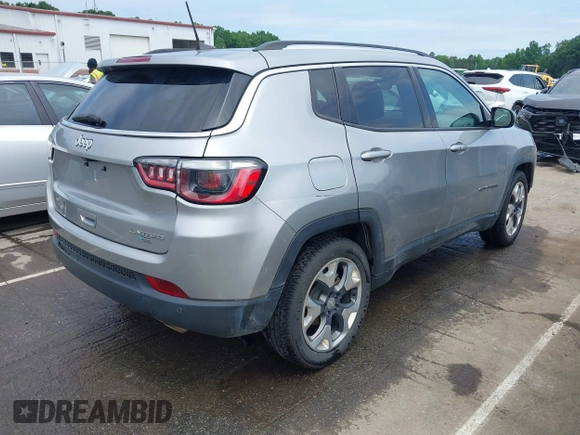 2021 Jeep Compass Limited with VIN 3C4NJCCB0MT573569, listed as a IAAI auction lot 42301154 with 106,812 mi miles and . Bid and sale history available at DreamBid. Image 4.