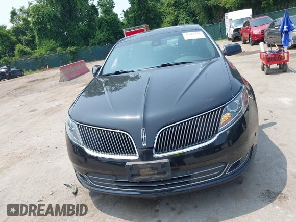 2013 Lincoln MKS EcoBoost with VIN 1LNHL9FT3DG602190, listed as a IAAI auction lot 42483472 with 63,238 mi miles and . Bid and sale history available at DreamBid. Image 12.