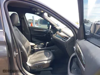 2017 BMW X1 xDrive28i with VIN WBXHT3Z33H4A65198, listed as a IAAI auction lot 41798503 with 88,951 mi miles. Bid and sale history available at carsss.com. Image 5.