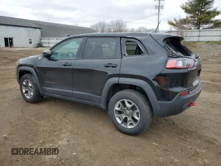 2019 Jeep Cherokee Trailhawk with VIN 1C4PJMBX7KD341534, listed as a Copart auction lot 52352765 with 207,532 mi miles and Salvage Title. Bid and sale history available at DreamBid. Image 2.
