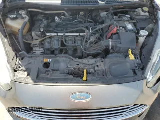 2014 Ford Fiesta SE z VIN 3FADP4BJ4EM110277, wystawiony jako Copart lot #56921115 z przebiegiem 126 536 mil mil oraz Szkoda całkowita • Salvage title. Historia ofert i sprzedaży dostępna na DreamBid. Obrazek 11.
