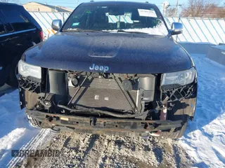 2014 Jeep Grand Cherokee Overland with VIN 1C4RJFCG1EC200570, listed as a IAAI auction lot 41301398 with 183,986 mi miles. Bid and sale history available at carsss.com. Image 18.