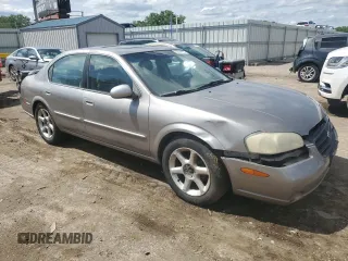 2000 Nissan Maxima GXE z VIN JN1CA31A9YT224416, wystawiony jako Copart lot #55514495 z przebiegiem 234 882 mil mil oraz Szkody całkowita. Historia ofert i sprzedaży dostępna na DreamBid. Obrazek 4.