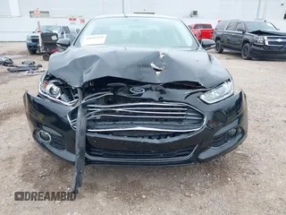 2014 Ford Fusion Titanium with VIN 3FA6P0K9XER364392, listed as a IAAI auction lot 41642439 with 130,302 mi miles and . Bid and sale history available at DreamBid. Image 6.