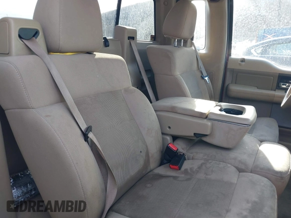 2005 Ford F-150 XL with VIN 1FTRF14W05NA77908, listed as a IAAI auction lot 41382643 with 128,135 mi miles. Bid and sale history available at carsss.com. Image 8.