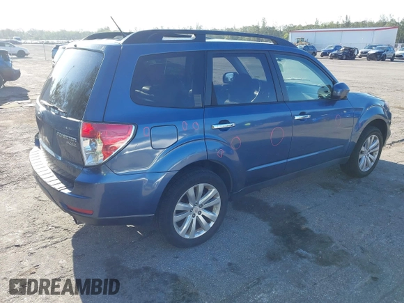 2011 Subaru Forester 2.5X Limited with VIN JF2SHAEC1BH754640, listed as a IAAI auction lot 42018735 with 130,780 mi miles. Bid and sale history available at carsss.com. Image 4.