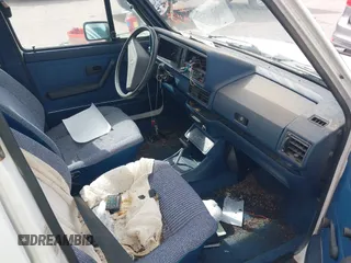 1982 Volkswagen Jetta z VIN WVWGA9161CW521961, wystawiony jako IAAI lot #42373314 z przebiegiem 52 051 mil mil oraz . Historia ofert i sprzedaży dostępna na DreamBid. Obrazek 5.