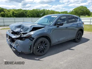 2024 Mazda CX-5 S Carbon Edition z VIN JM3KFBCL9R0514538, wystawiony jako Copart lot #58518615 z przebiegiem 23 037 mil mil oraz Tytuł czysty. Historia ofert i sprzedaży dostępna na DreamBid. Obrazek 1.
