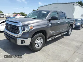 2019 Toyota Tundra SR5 with VIN 5TFEY5F10KX244690, listed as a Copart auction lot 58535835 with 107,264 mi miles and Salvage title. Bid and sale history available at DreamBid. Image 1.
