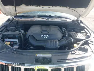 2012 Jeep Grand Cherokee Laredo with VIN 1C4RJFAG2CC176313, listed as a IAAI auction lot 42098127 with 162,556 mi miles. Bid and sale history available at carsss.com. Image 10.