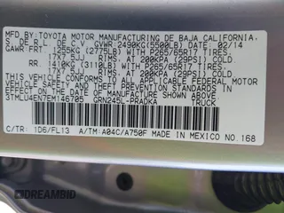 2014 Toyota Tacoma with VIN 3TMLU4EN7EM146705, listed as a IAAI auction lot 41949827 with 147,887 mi miles and . Bid and sale history available at DreamBid. Image 9.