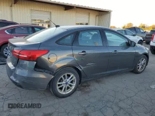 2017 Ford Focus SE z VIN 1FADP3F25HL331714, wystawiony jako Copart lot #77389764 z przebiegiem 49 953 mil mil oraz Szkoda całkowita • Salvage title. Historia ofert i sprzedaży dostępna na DreamBid. Obrazek 3.
