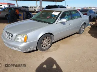 2003 Cadillac DeVille DTS z VIN 1G6KF57923U260229, wystawiony jako IAAI lot #41415468 z przebiegiem 58 012 mil mil oraz . Historia ofert i sprzedaży dostępna na DreamBid. Obrazek 2.