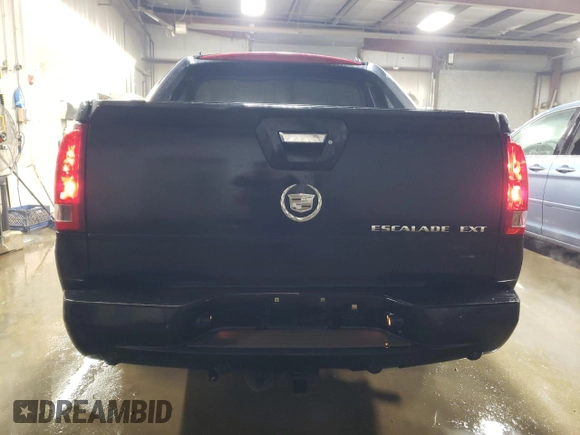 2003 Cadillac Escalade EXT z VIN 3GYEK63N33G118001, wystawiony jako Copart lot #86897574 z przebiegiem 223 953 mil mil oraz Szkoda całkowita • Salvage title. Historia ofert i sprzedaży dostępna na DreamBid. Obrazek 6.