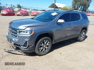 2021 GMC Acadia SLT with VIN 1GKKNMLS1MZ218856, listed as a IAAI auction lot 41797665 with 59,958 mi miles. Bid and sale history available at carsss.com. Image 2.