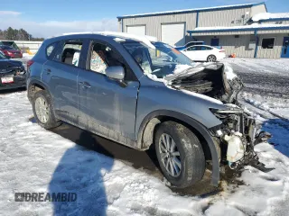 2014 Mazda CX-5 Sport with VIN JM3KE4BE2E0360024, listed as a Copart auction lot 47014035 with Not provided miles and Salvage title. Bid and sale history available at DreamBid. Image 4.
