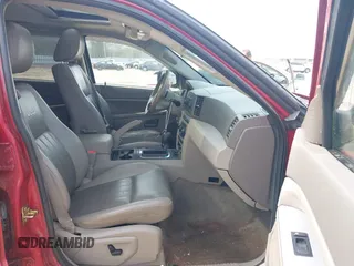 2005 Jeep Grand Cherokee Laredo with VIN 1J4HS48N95C711992, listed as a IAAI auction lot 41944696 with 209,299 mi miles and . Bid and sale history available at DreamBid. Image 5.