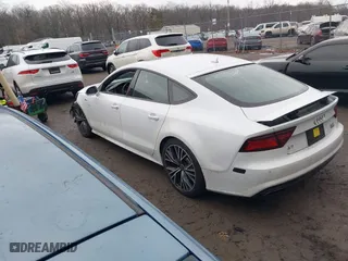 2017 Audi A7 Premium Plus with VIN WAUW2AFC0HN085266, listed as a IAAI auction lot 41461035 with 135,459 mi miles. Bid and sale history available at carsss.com. Image 3.
