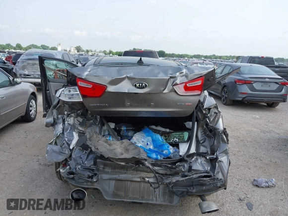 2015 Kia Optima EX with VIN 5XXGN4A70FG442402, listed as a IAAI auction lot 42260968 with 94,512 mi miles and . Bid and sale history available at DreamBid. Image 15.