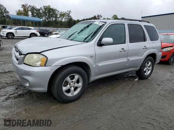 2006 Mazda Tribute i with VIN 4F2YZ02Z26KM14821, listed as a Copart auction lot 71718434 with 318,841 mi miles and Salvage Title. Bid and sale history available at carsss.com. Image 1.