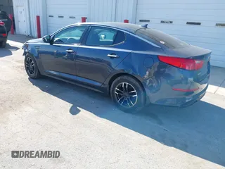 2015 Kia Optima LX with VIN 5XXGM4A77FG381505, listed as a IAAI auction lot 42105568 with 164,641 mi miles and . Bid and sale history available at DreamBid. Image 3.