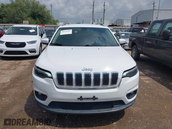 2019 Jeep Cherokee Latitude Plus with VIN 1C4PJMLB5KD198571, listed as a IAAI auction lot 42126995 with 124,230 mi miles. Bid and sale history available at carsss.com. Image 12.