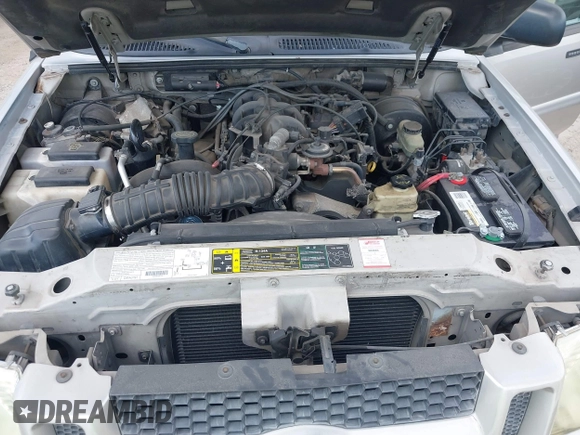 2003 Ford Explorer Sport Trac XLS z VIN 1FMZU67E43UA72537, wystawiony jako IAAI lot #42575959 z przebiegiem 142 692 mil mil oraz . Historia ofert i sprzedaży dostępna na DreamBid. Obrazek 10.