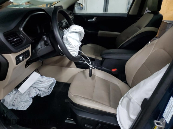 2020 Ford Escape Titanium Hybrid z VIN 1FMCU9DZ0LUA74302, wystawiony jako Copart lot #48614065 z przebiegiem 91 923 mil mil oraz Szkoda całkowita • Salvage title. Historia ofert i sprzedaży dostępna na DreamBid. Obrazek 7.