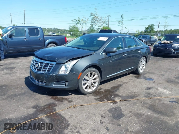 2014 Cadillac XTS Luxury z VIN 2G61M5S37E9211547, wystawiony jako IAAI lot #42373128 z przebiegiem 146 354 mil mil oraz . Historia ofert i sprzedaży dostępna na DreamBid. Obrazek 17.