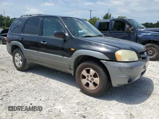 2002 Mazda Tribute LX with VIN 4F2YU09182KM12760, listed as a Copart auction lot 61292724 with 226,479 mi miles and Salvage Title. Bid and sale history available at carsss.com. Image 4.