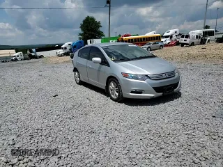 2010 Honda Insight EX with VIN JHMZE2H76AS021610, listed as a Copart auction lot 62992225 with 162,974 mi miles and Salvage title. Bid and sale history available at DreamBid. Image 14.